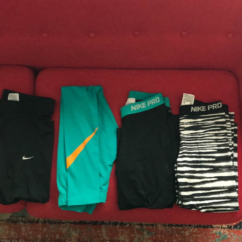 Four pair of Nike women’s workout tights MMLS